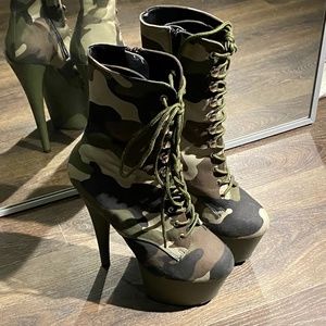 Camo high heel platform boots.
